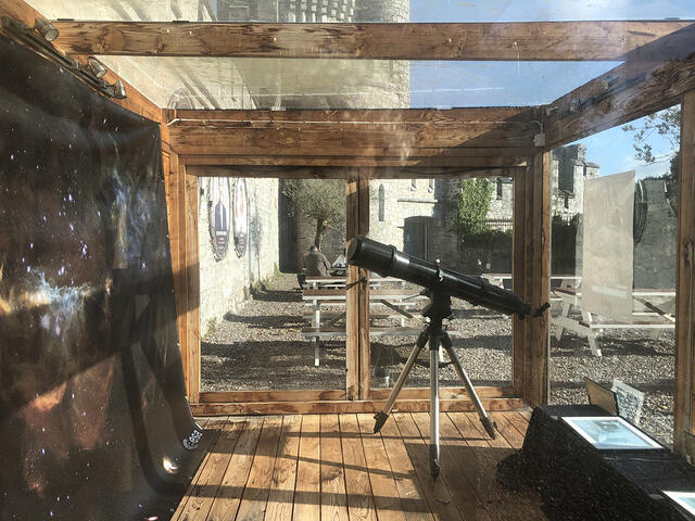 Timber pavilion built on the CCAE deck, with a telescope beneath it